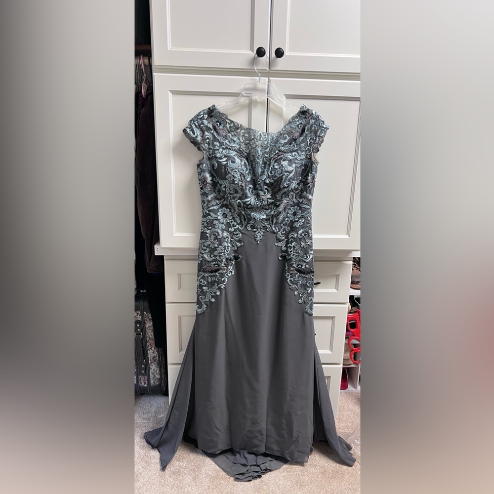 Mother of the bride worn one time. Altered from a 14 fits size 10-12